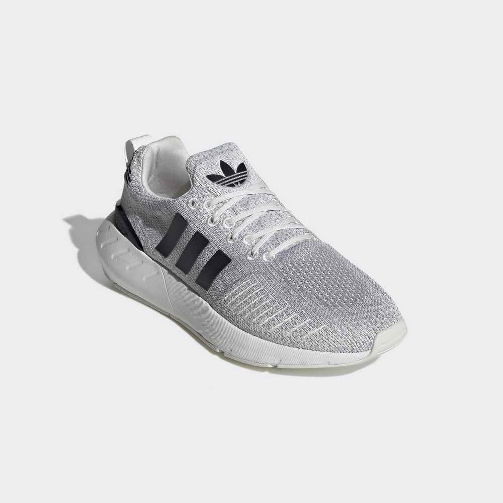 white adidas swift run